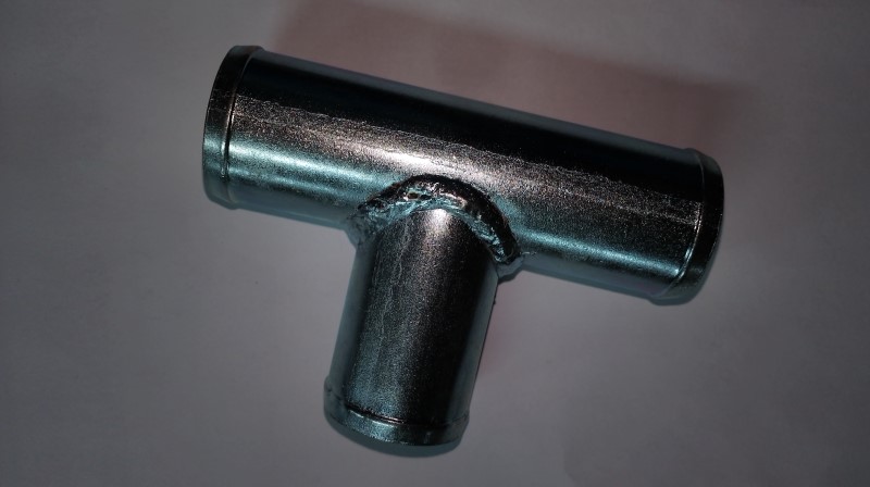 Трубка тройник D-32х32 (переходник шлангов) цинк